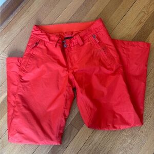 The North Face women’s ski and board snow pants insulated size M orange.
